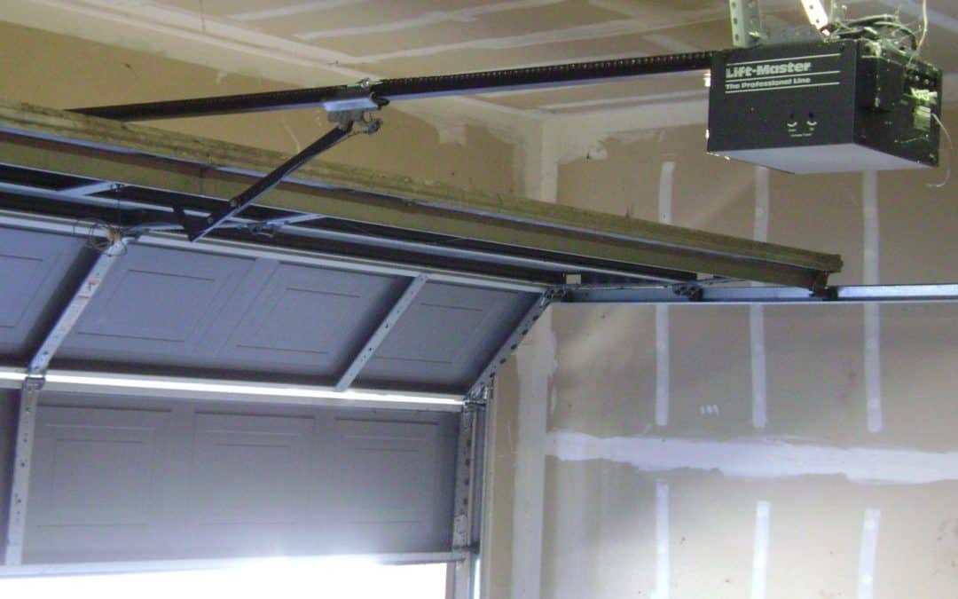 Professional technician performing overhead garage door repair for Parrish Garage Door Repair