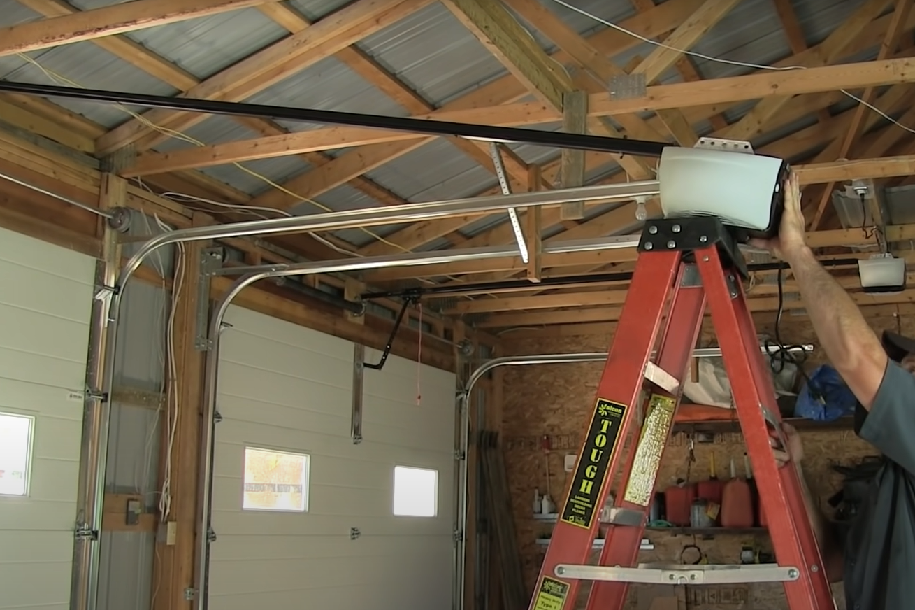 Professional technician providing expert Garage Door Opener Repair for Parrish Garage Door Repair service.