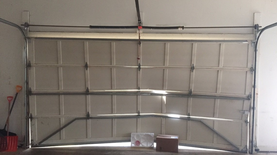 Garage Door Replacement service provided by Parrish Garage Door Repair. Replace your old door with expert care for improved functionality and style.
